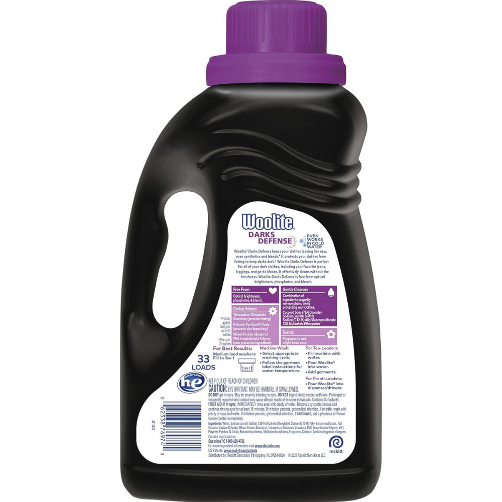 Back of a bottle of Woolite Darks Defense liquid laundry detergent with instructions and warnings.