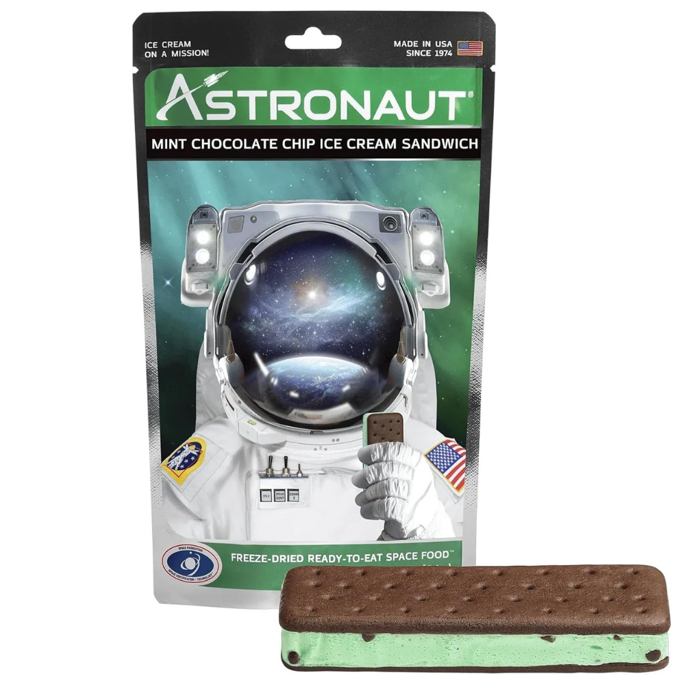 Package of astronaut mint chocolate chip ice cream sandwhich with ice cream sandwich depicted. 