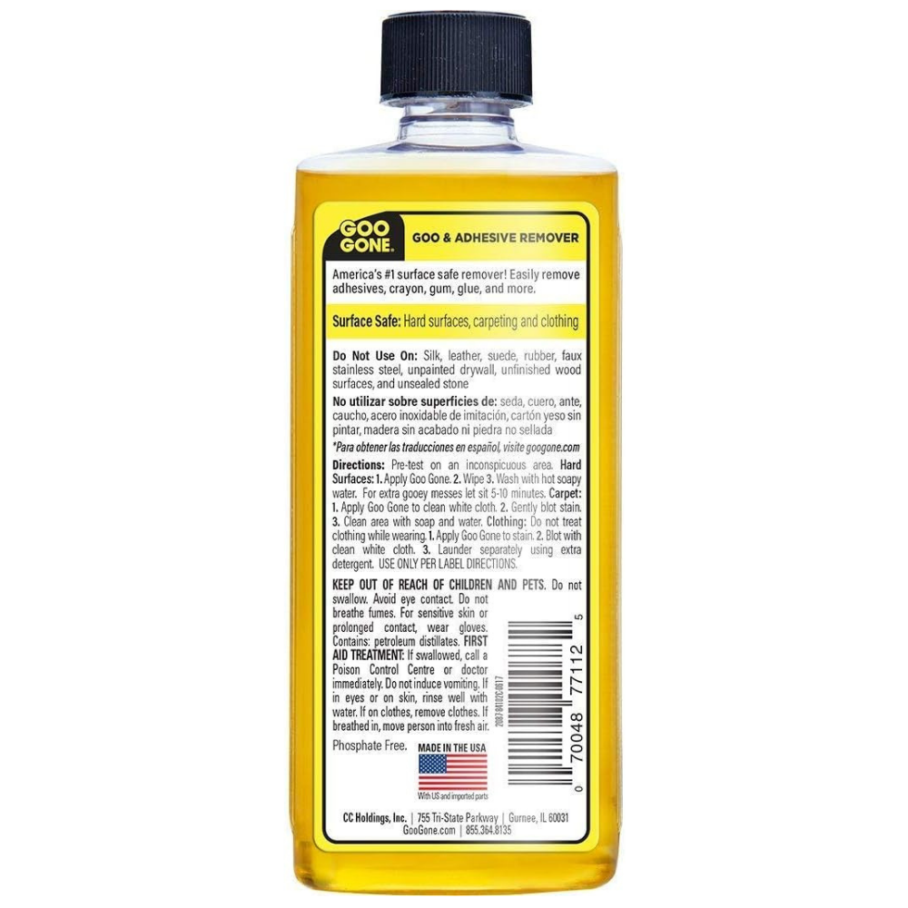 Back of a bottle of Goo Gone - goo & adhesive remover with directions and informations. 