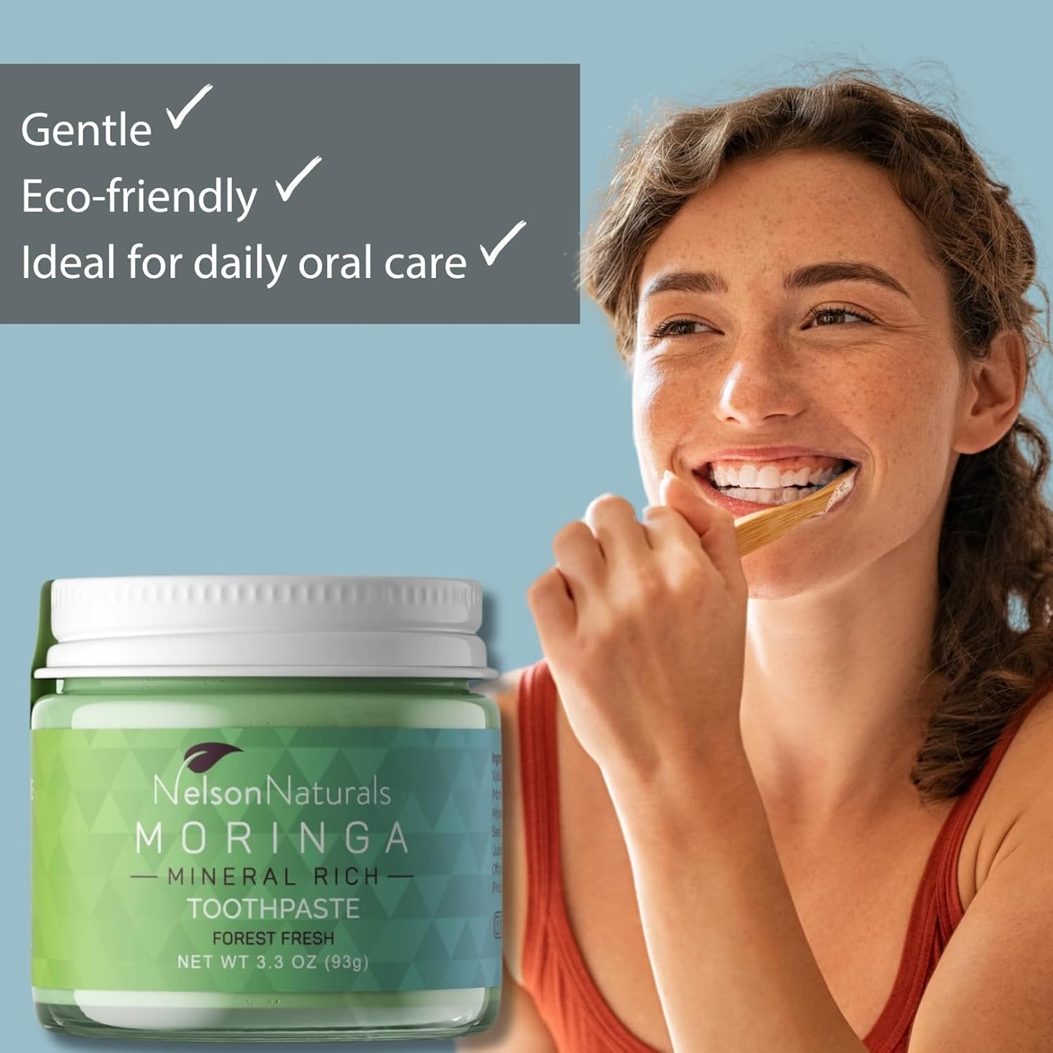 Woman brushing her teeth with Nelson Naturals Moringa minerals rich toothpaste (forest fresh) is gentle, eco-friendly and ideal for daily oral care